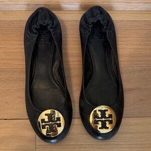 Tory Burch Black Flats with Gold Emblem